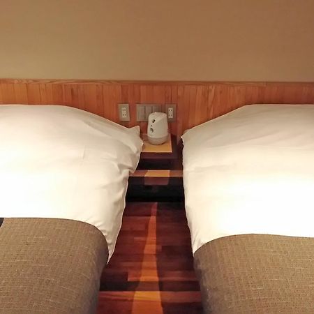 Niseko Konbu Onsen Tsuruga Moku-No-Sho Hotell Rum bild